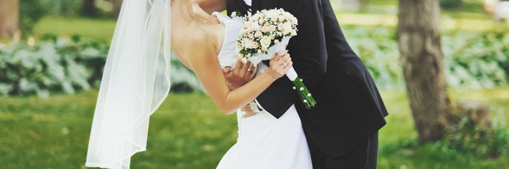 bride and groom with bouquet flowers